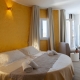 I6101_20240909120945_hotel_glorian_pula_sardegna_camera_comfort_junior_suite_oro_03_2.jpg